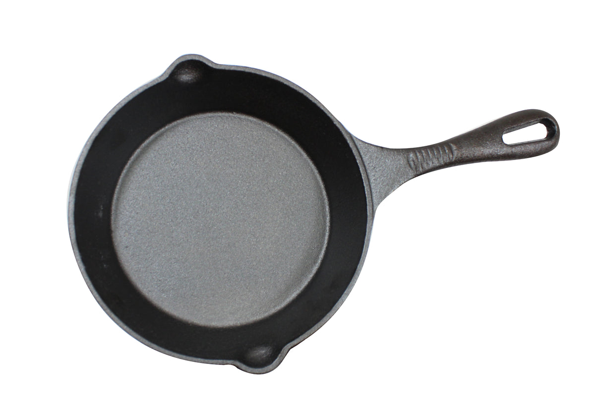 A round, black cast iron skillet with a textured surface, two small pouring spouts on the rim, and a long handle with a hole at the end. This induction ready skillet is shown from above on a white background.