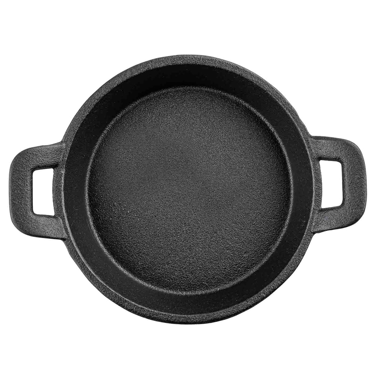 A round, black TableCraft cast iron skillet is shown from above, featuring a textured surface and two rectangular handles. This Mini Server pan is empty and centered on a white background.