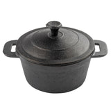 This TableCraft Mini Casserole Dutch oven features black cast iron with a matching lid and handle. With its two side handles and rough, textured finish, the design is rustic, sturdy, and perfect for single servings.