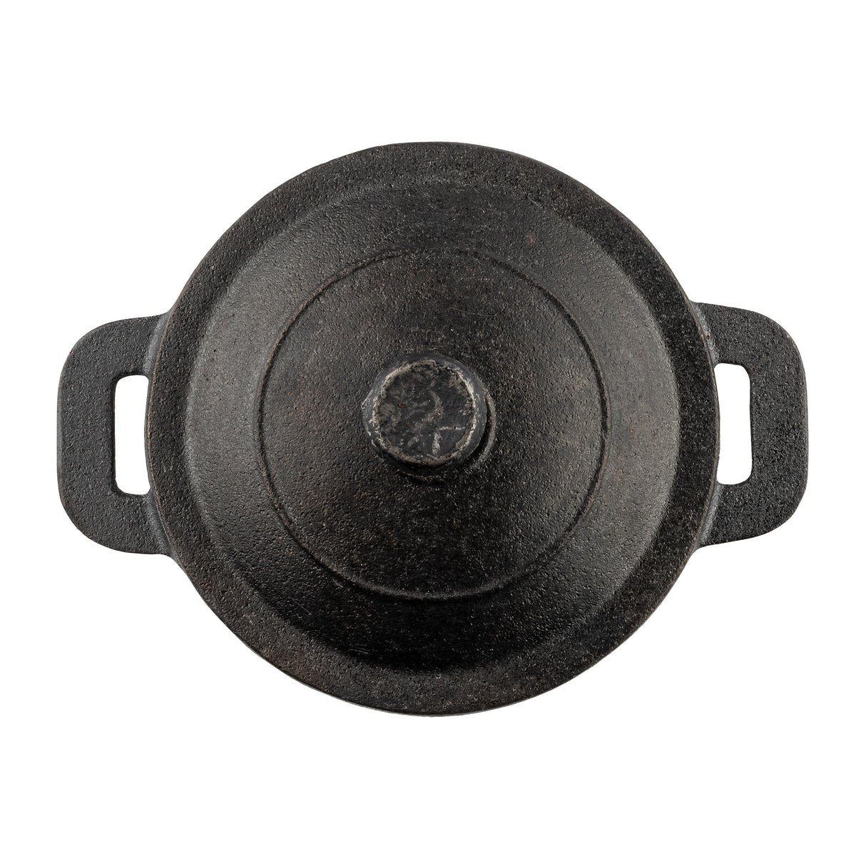 Top view of a round, black TableCraft cast iron mini casserole pot with a lid. The pot features two rectangular handles and a knob on the lid. Its textured, slightly worn surface is set against a white background.