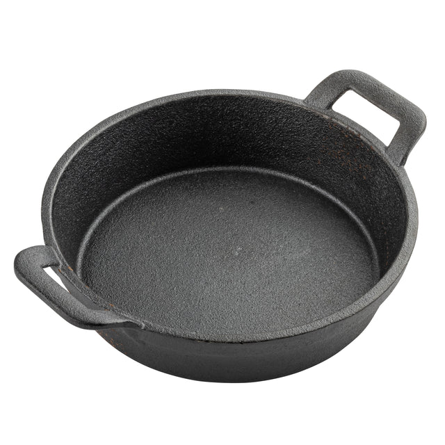 A black TableCraft cast iron pan with a textured surface and two rectangular handles sits empty on a white background. The round, deep pan has slightly flared sides, perfect as a Fajita Platter, with thick integrated handles for durability.