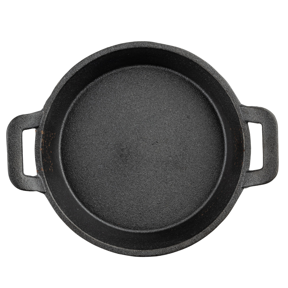 A top-down view of a round, black TableCraft cast iron skillet with two short handles on opposite sides. The fajita platter has a slightly rough texture and appears empty, resting on a white background.