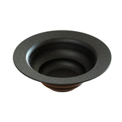 A black, round, wide-rimmed cast aluminum salad bowl with gently sloped sides and a textured, speckled surface. Its interior features concentric circular steps for a sculptural, layered design. The background is plain white.