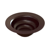 A dark brown, round salad bowl with a wide, flat rim and tiered, concentric circular steps descending inside toward the center creates a layered, modern design. Made of cast aluminum, it features a smooth, slightly speckled surface and is dishwasher safe.