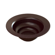 A dark brown, round salad bowl with a wide, flat rim and tiered, concentric circular steps descending inside toward the center creates a layered, modern design. Made of cast aluminum, it features a smooth, slightly speckled surface and is dishwasher safe.