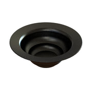 A black, round salad bowl with three circular tiers, speckled with white dots, is crafted from cast aluminum. Viewed from above on a white background, the wide rim curves inward toward a deep center and is dishwasher safe.