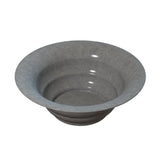 A gray, shallow, circular cast aluminum salad bowl with a wide rim and smooth surface, resembling stone or ceramic. The empty bowl is viewed from a slightly elevated angle, showcasing its inner and outer contours—ideal for cold holding.