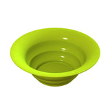 A bright green, collapsible silicone salad bowl is shown upright on a white background. The bowl has a wide rim and smooth, glossy surfaces with visible ridges that highlight its collapsible design, making it perfect for cold holding salads.