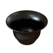 A glossy black salad bowl with a wide rim, crafted from cast aluminum and decorated with tiny white speckles resembling stars in the night sky. Both surfaces share this starry pattern, perfect for cold holding on its small, circular base.
