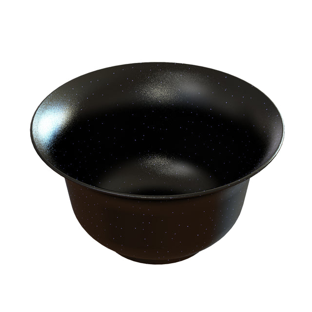 A wide, shallow black salad bowl with a glossy finish, speckled with tiny white dots resembling stars. Made from cast aluminum, this cosmic bowl is dishwasher safe and features the starry-night pattern inside and out. Empty and isolated on white.