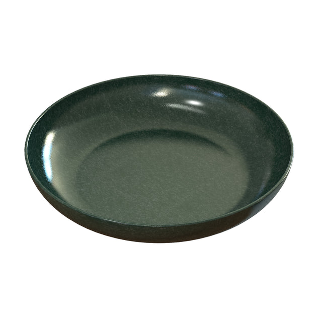 A round, dark green ceramic pasta bowl with a shallow depth and smooth, glossy surface. The plate has a subtle speckled pattern and is photographed on a plain white background, viewed at an angle showing the inner and outer edges.