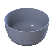 A plain, matte gray cast aluminum bowl with a smooth, rounded shape and subtle horizontal grooves around its exterior, shown on a white background. The bowl has a simple, modern design and appears empty.