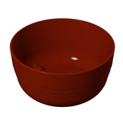 A simple, empty, round fruit bowl with smooth sides and a glossy dark reddish-brown finish, shown against a plain white background. The bowl has subtle horizontal grooves near its base.