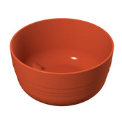 A plain, round, orange fruit bowl with a smooth surface and subtle horizontal lines near the bottom, shown on a white background. The bowl has a small raised tab or ridge on the inner side.