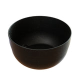 A black, round cast aluminum bowl with a matte, slightly textured finish is shown against a white background. The inside is smooth and dark, making it ideal as a fruit bowl with a wide opening and gently curving sides.