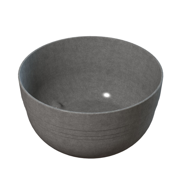A grey cast aluminum bowl with a light reflecting off of it, ideal for use as a stylish fruit bowl or for cold holding foods.