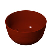A simple, empty, round fruit bowl with a smooth, glossy surface and a deep reddish-brown color sits on a white background. The bowl has faint horizontal lines near the base for subtle texture.