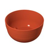 A plain, round, reddish-brown cast aluminum bowl with a smooth surface and subtle horizontal lines near the base, shown empty against a white background. The simple, modern fruit bowl design features no additional decorations.