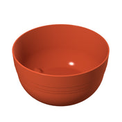 A plain, round, reddish-brown cast aluminum bowl with a smooth surface and subtle horizontal lines near the base, shown empty against a white background. The simple, modern fruit bowl design features no additional decorations.