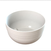 A plain white ceramic fruit bowl with a smooth surface and three subtle horizontal lines around its exterior. The bowl is empty and photographed against a white background, giving it a clean, minimalist appearance.