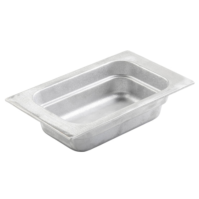 A rectangular, metallic, silver food pan with rounded corners and a wide rim. Made of cast aluminum, it features smooth, slightly sloped sides. Ideal for cold holding, the empty pan is shown angled on a white background.