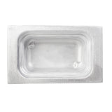 A rectangular, shallow, empty cast aluminum food pan viewed from above. The tray has rounded corners and a smooth, slightly textured surface with indents in two corners. The metallic sheen suggests durability for cold holding applications.
