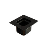 A black, square steam table pan made of plastic features a wide, flat rim and a deep, hollow center. Photographed on a white background, the container displays a shiny surface and rounded inner edges.