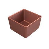 A 3D render of a small, empty, square-shaped bowl with smooth, slightly rounded edges and a matte copper finish, crafted from cast aluminum for effective cold holding, shown at an angle on a white background.