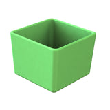A simple, empty, green plastic square container with rounded corners and smooth surfaces—ideal as a dishwasher safe bowl—shown from a slightly elevated angle on a white background.