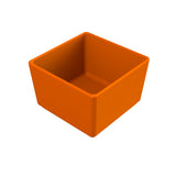 A small, empty, square-shaped orange bowl with smooth edges and a glossy finish is shown against a plain white background. This cast aluminum bowl is viewed from a slightly elevated angle, clearly displaying its interior and depth.