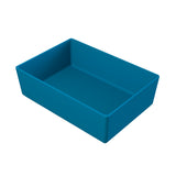 A rectangular, deep blue plastic tray with smooth sides and a flat bottom, shown at an angle on a white background. Ideal as a cold holding bowl and dishwasher safe, its interior and exterior are visible, casting a faint shadow.