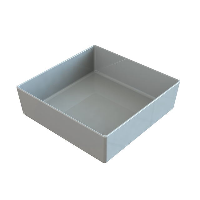 A square, shallow, light gray dishwasher safe bowl with smooth sides. Made of plastic or ceramic, this glossy and reflective container is empty and set against a plain white background.