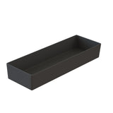 A rectangular, matte black cast aluminum bowl with a minimalist design, straight edges, and slightly rounded corners. The tray is empty and shown against a white background, highlighting its simple and modern appearance.