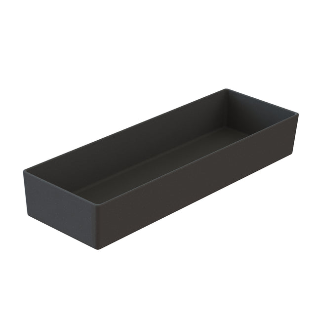 A rectangular, deep, matte-black cast aluminum bowl with straight sides and rounded corners, photographed from an angle showing the inside and two sides. The tray is empty and placed against a plain white background.