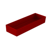 A rectangular, deep red cast aluminum tray with high sides and a smooth surface, shown on a white background. Positioned at an angle, the tray is empty, revealing its depth and interior. This dishwasher safe bowl is both stylish and practical.