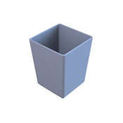 A plain, light blue, plastic bowl-shaped container with smooth sides and a slightly tapered base, photographed on a white background. The container appears empty and is positioned at an angle showing both the front and side.