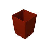 A 3D-rendered image of a red, empty, square-shaped cast aluminum bowl with smooth sides and a matte finish, set against a plain white background. The container is viewed from above, showcasing its open top and clean, modern design.