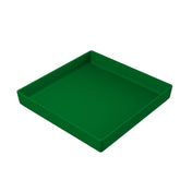A green, square, plastic tray with raised edges is shown at an angle on a white background. The tray is empty and has smooth surfaces, making it suitable for holding a cold holding bowl or serving various items.