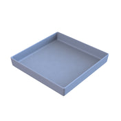 A blue square cold holding bowl, Duracoat coated cast aluminum, sits on a white background and is dishwasher safe.