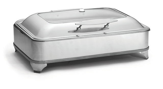 A rectangular stainless steel chafer with a fitted lid and large handle on top, resting on four short legs. This sleek, modern 9 quart chafer keeps food warm and stylishly presented during serving.