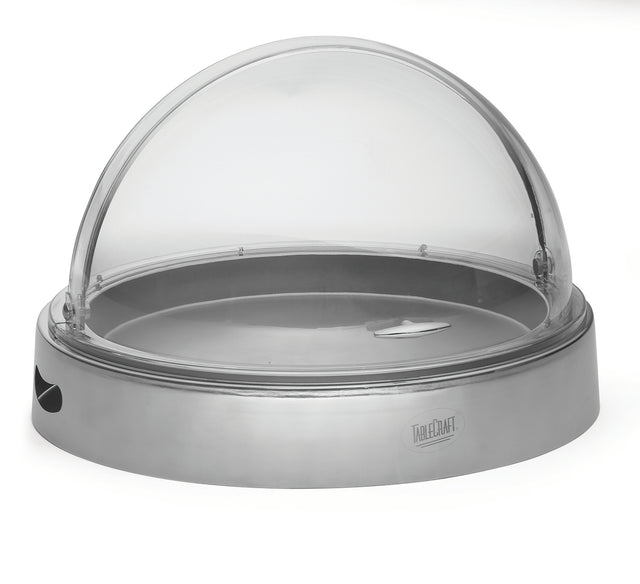 A round cold server with a stainless steel base and a clear polycarbonate dome lid. The tray features a small handle on top for easy lifting, a side cutout, and the TableCraft brand visible on the front.