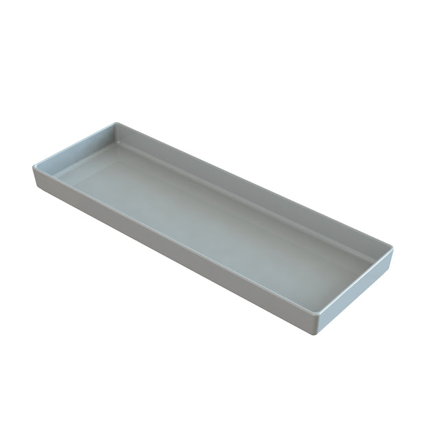 A rectangular, shallow, light gray tray made from Duracoat coated cast aluminum with straight sides and smooth surfaces. This minimalist tray is NSF dishwasher safe and empty, viewed from a slightly elevated angle against a white background.