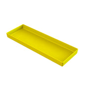 A rectangular, shallow yellow tray with raised edges on all sides, made of Duracoat coated cast aluminum, is viewed at an angle against a white background. The empty tray’s smooth, glossy surface and vibrant color are clearly visible.