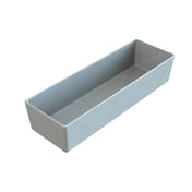 A rectangular, shallow, gray plastic tray with smooth sides and slightly rounded edges, photographed on a white background. This minimalist cold holding bowl is empty and perfect for modern kitchens.