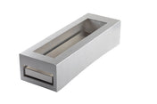 A rectangular stainless steel object with a hollow center and a slot at one end, resembling a modern, minimalist mail slot or letterbox from TableCraft Products, photographed on a white background.
