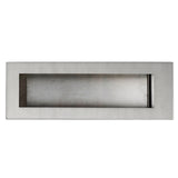 A rectangular mail slot with a brushed finish and recessed center features a straight, clean edge design. Horizontal and modern, it has a cutout along the top edge. The background is plain white, evoking the minimalism of TableCraft Products.