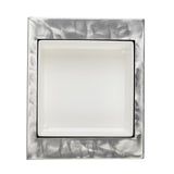 A half size, rectangular metallic plate with a brushed, swirling pattern frames a recessed, frosted white square light fixture. The clean, modern design evokes the quality of TableCraft Products' cooling station accessories.