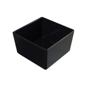 A black, square-shaped cast aluminum bowl with smooth, glossy sides and sharp edges is viewed from above, revealing its deep interior and slightly reflective surface. The bowl appears empty and is set against a white background.
