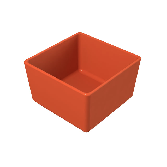 A plain, square-shaped orange cast aluminum bowl with smooth surfaces is shown on a white background. The bowl has straight sides, rounded edges, and an open top, appearing ideal as a dishwasher safe bowl for everyday use.