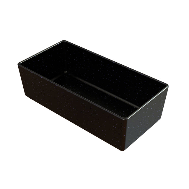 A rectangular, deep, black cast aluminum bowl with smooth sides and small white speckles evenly distributed across its surface. The empty container is photographed at an angle, showing both the inside and two outer sides.